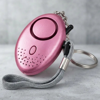 Llavero Mini Alarma Personal Para Seguridad Rosa Chicle