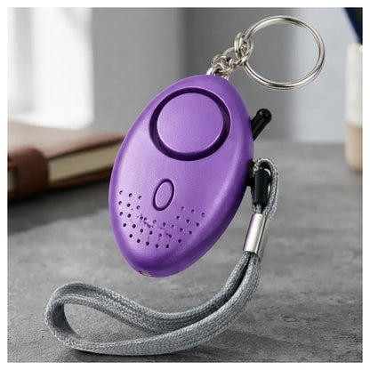 Llavero Mini Alarma Personal Para Seguridad Violeta